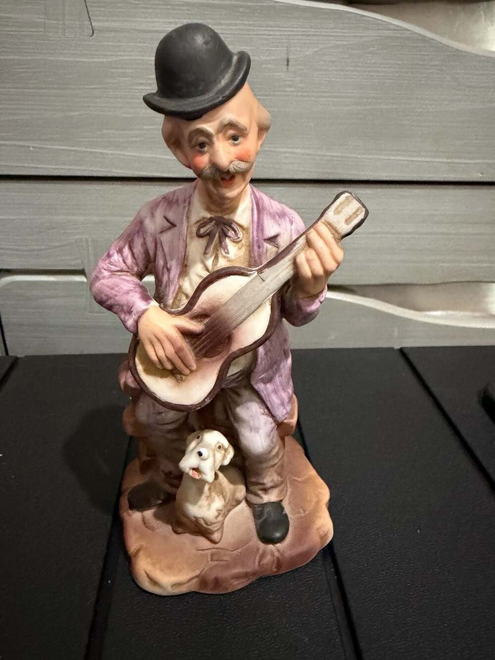 Vintage Porcelain Figurine of Man in Bowler Hat Playing Guitar with Dog